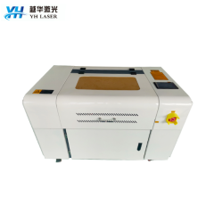 YH-6040 Mini CO2 laser cutting machine Price need to negotiate with the seller